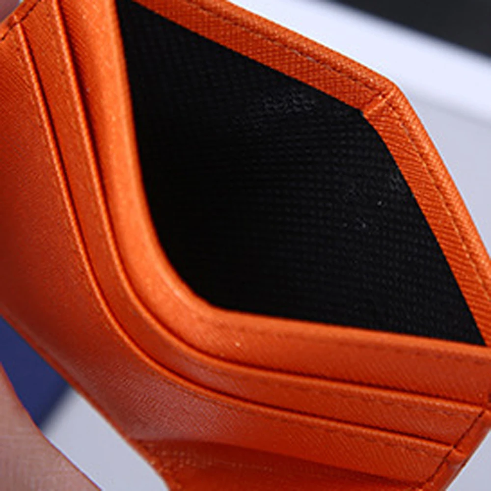 Minimalistische dames heren le - Coin Holder Men recensie en prijs